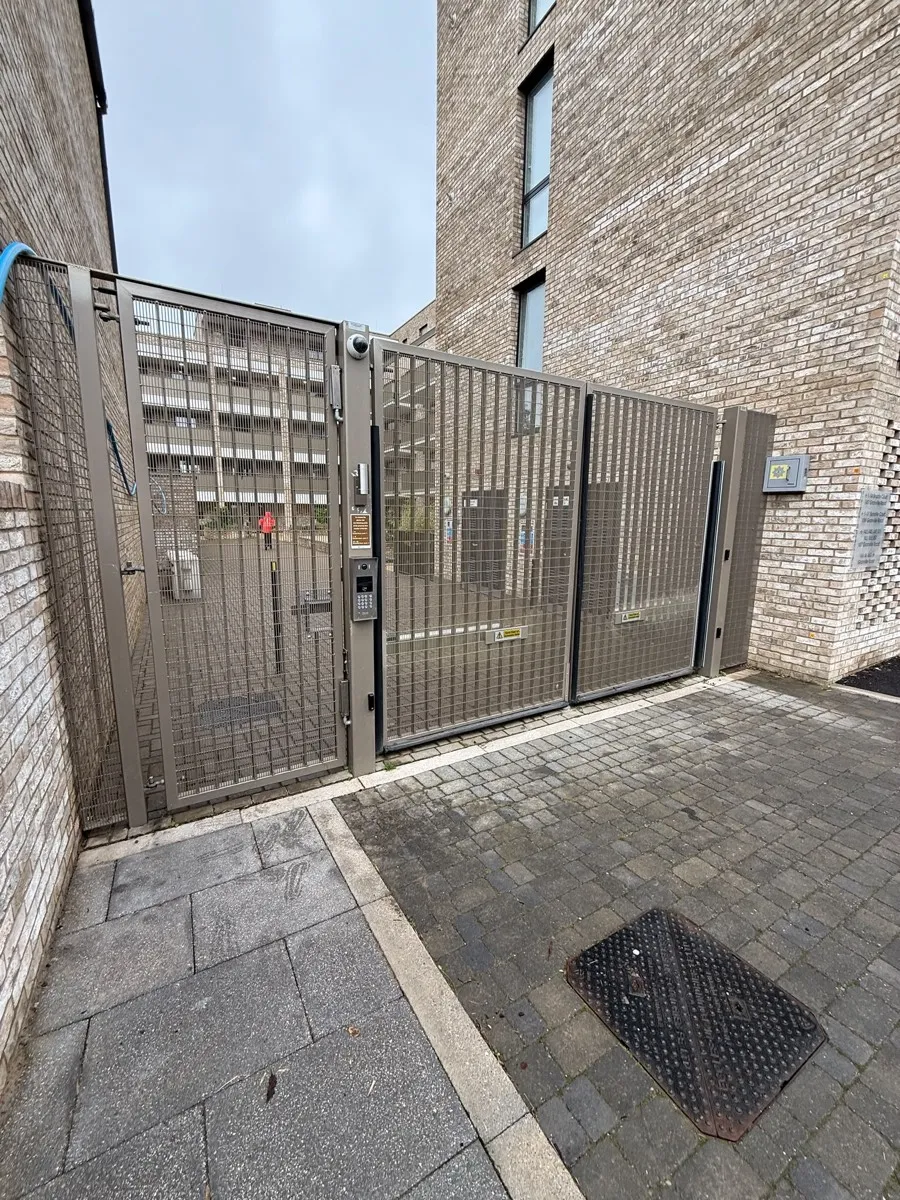 The gated development entrance off Granville Road, with the intercom panel on the left-hand post.